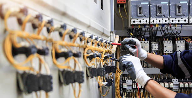 Professional Electrician technician working in Sardis City, AL